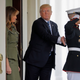 President Trump awkwardly pats a US Marine on the back outside the West Wing of the White House on April 27, 2017 (AP Photo/Pablo Martinez Monsivais)